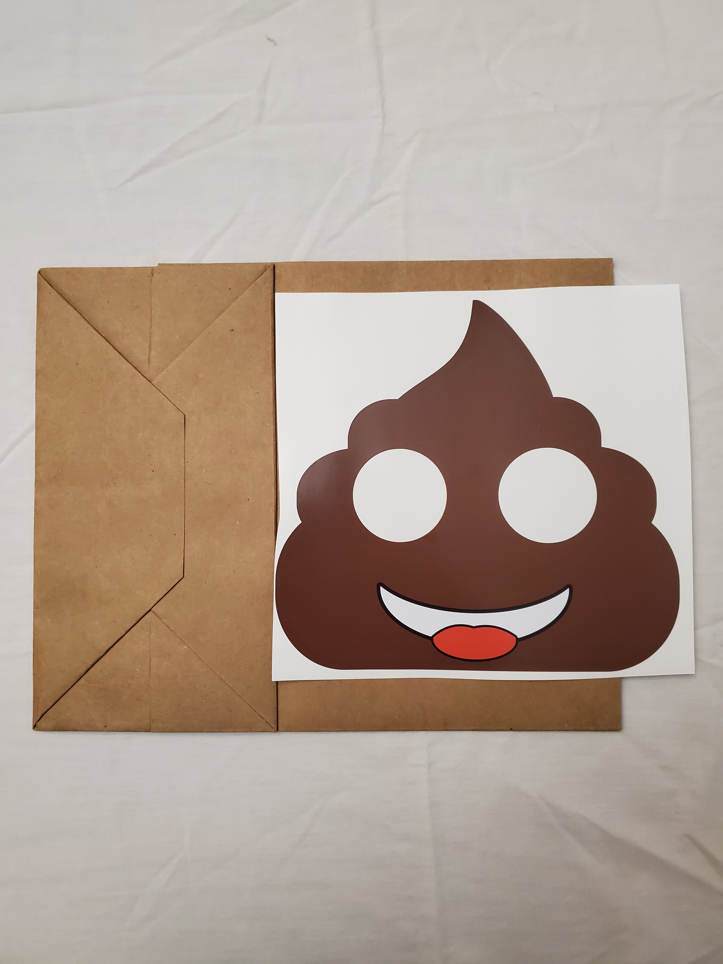 Poop emoji paper bag mask kit