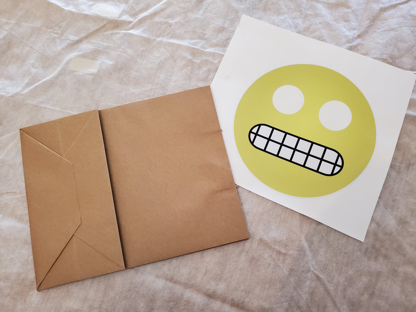 Grimacing emoji paper bag mask kit