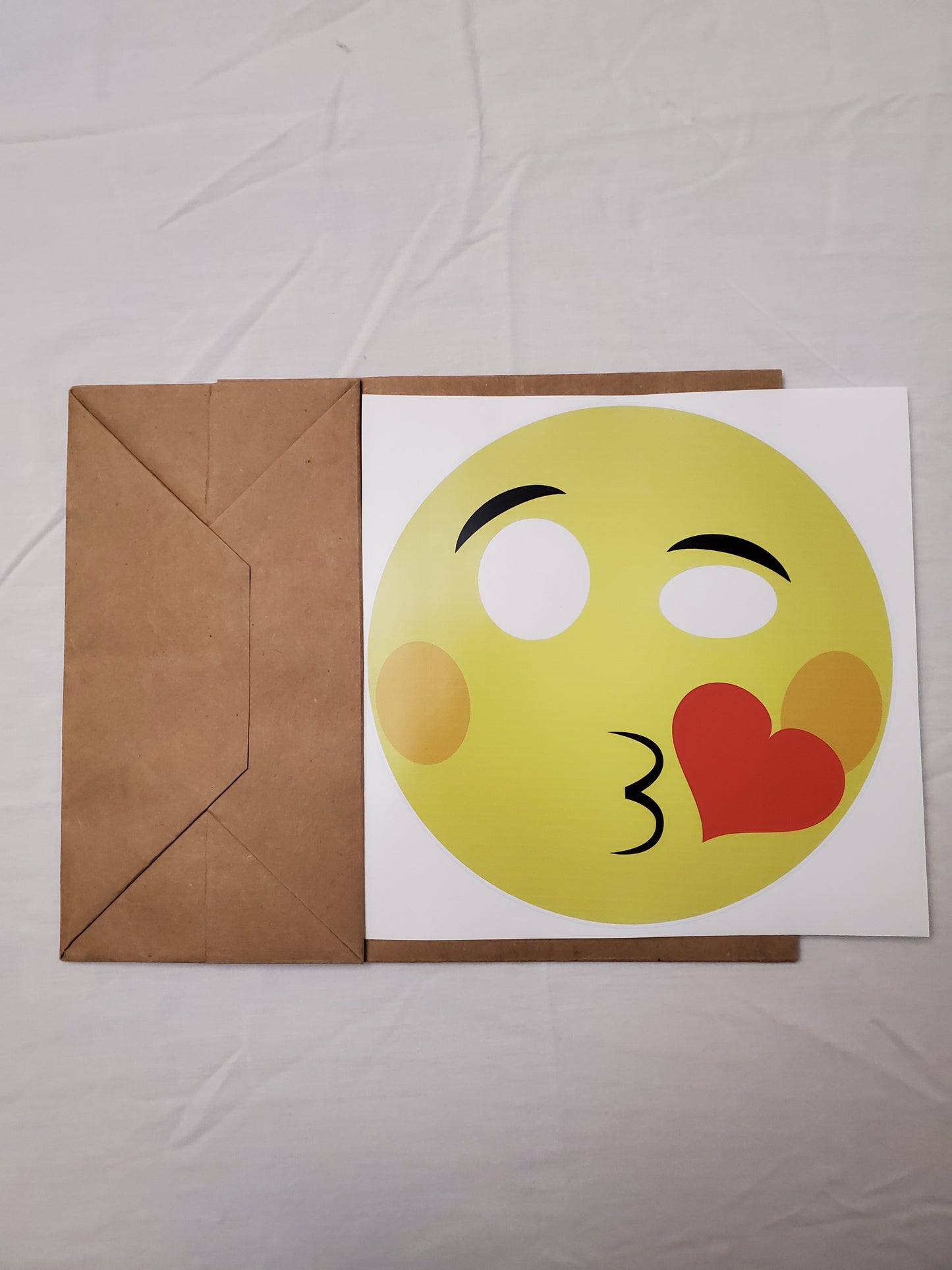 Blowing a Kiss emoji paper bag mask kit